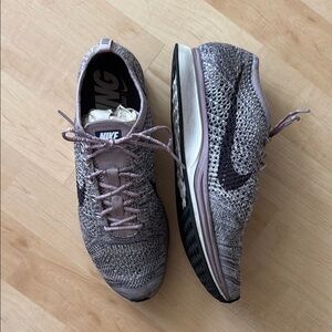 Nike Gray Athletic Shoes with Textured Design
